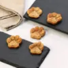 Showing 5 piece of Wiggles N' Nibbles Paw Shape Cake on the table For Dogs and Cats
