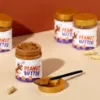 Showing 4 Wiggles N' Nibbles Peanut Butter Jars with Spoon